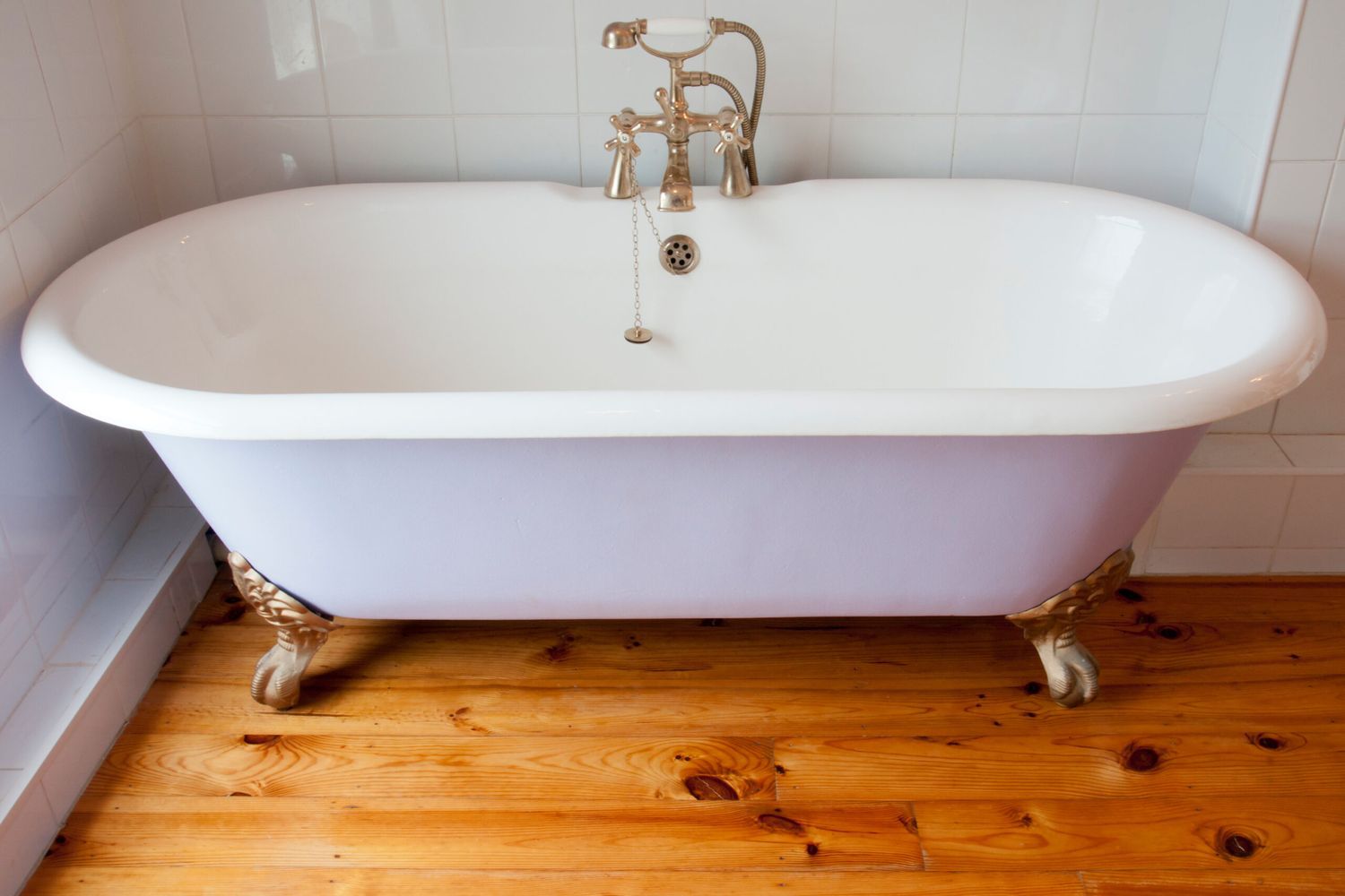 A clawfoot bathtub refinished to no longer look worn out.