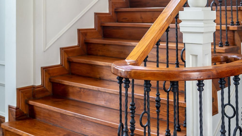 A picture of wooden squeaky stairs inside a residential home