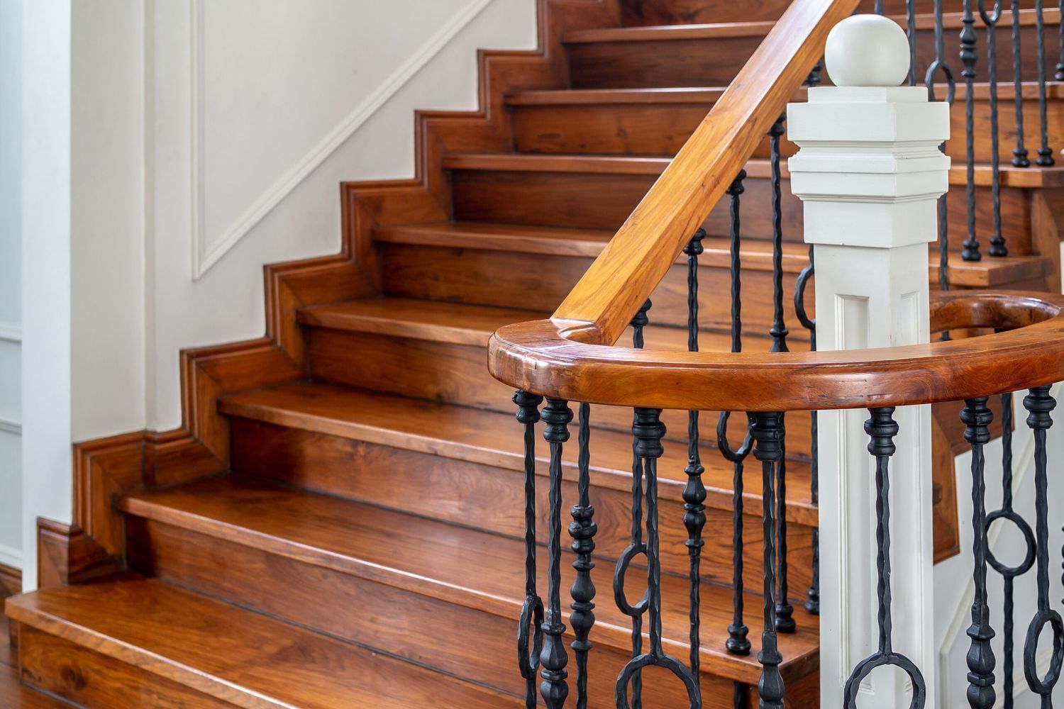 A picture of wooden squeaky stairs inside a residential home