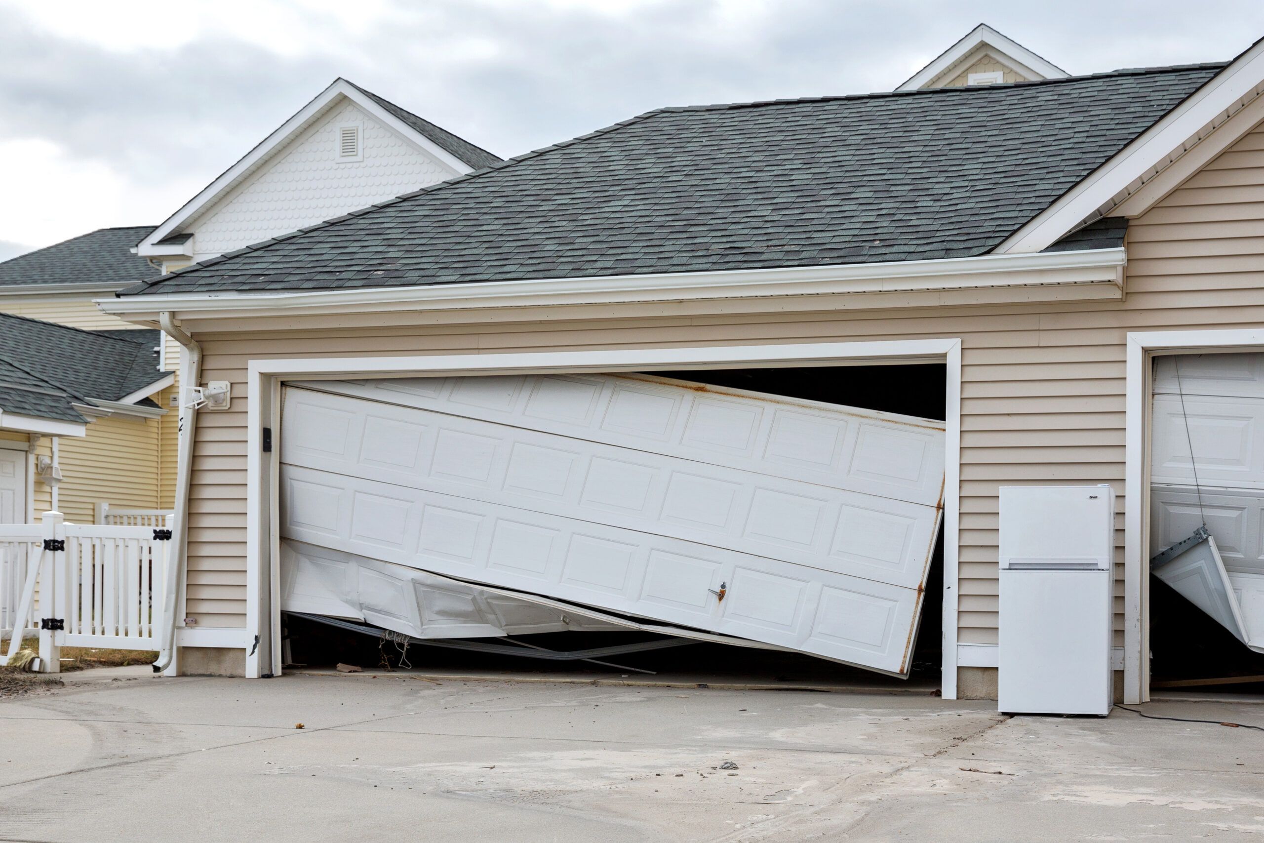 A garage door that was knocked off because of a hurricane