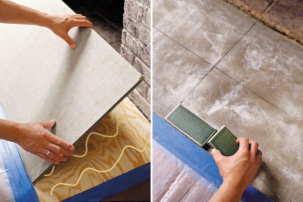 Photo of a contractor measuring and marking the hearth in preparation for tiling it.