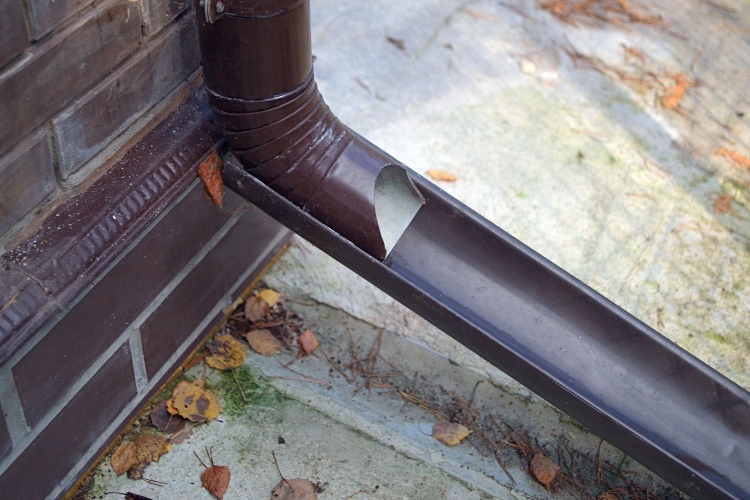 Image of a gutter downspout with an extension added. iStock_1205986956