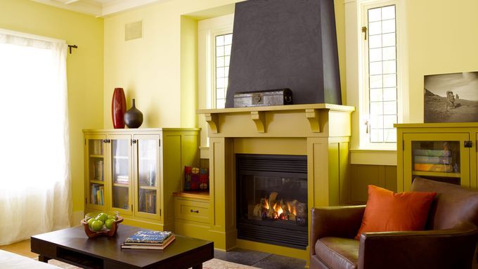 A gas fireplace in a living room.