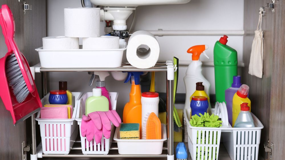 View under a sink with many household products