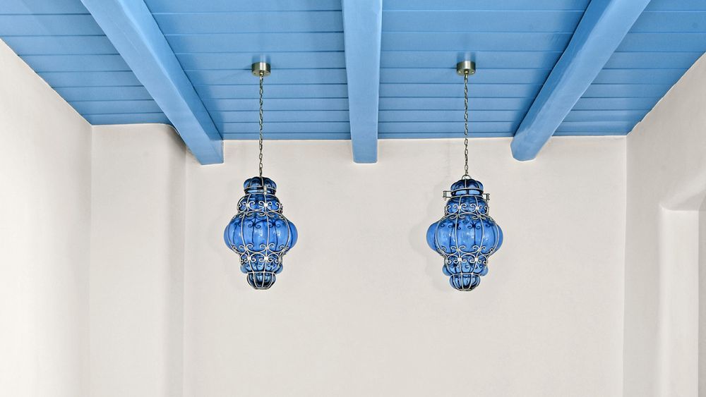 Blue ceiling paint with blue light fixtures.