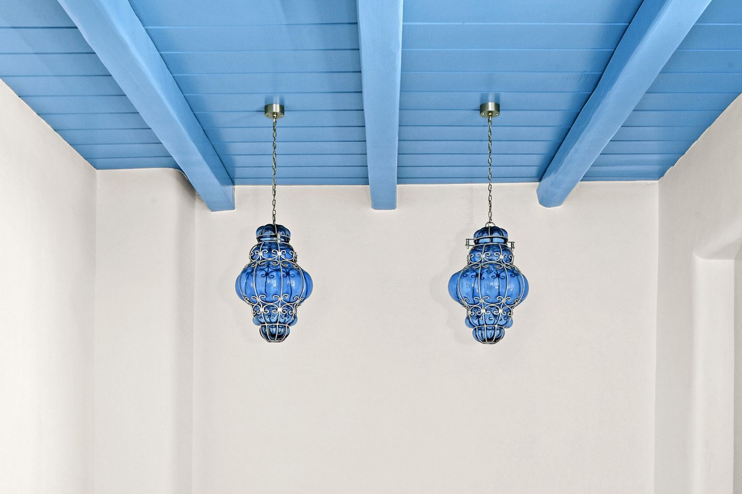 Blue ceiling paint with blue light fixtures.