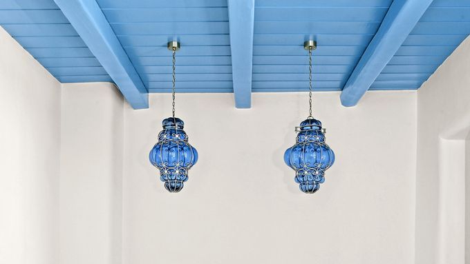 Blue ceiling paint with blue light fixtures.