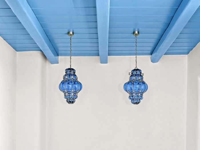 Blue ceiling paint with blue light fixtures.