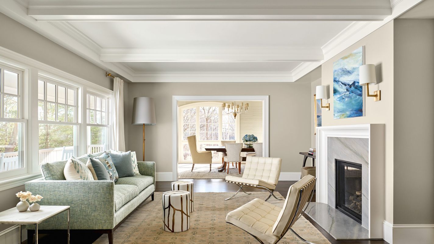 Living room with fireplace and coffered ceilings