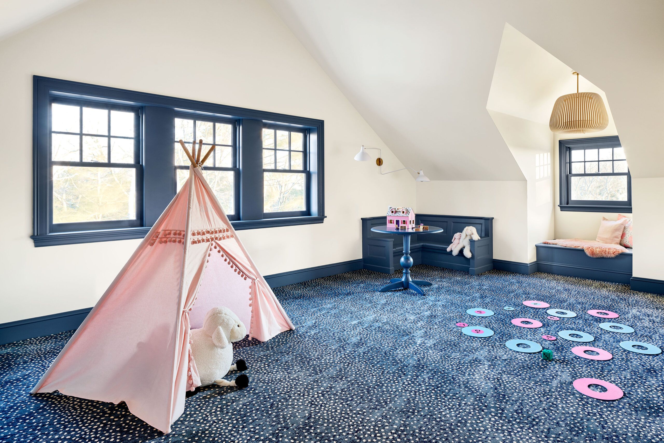 Childs play room with dark blue carpet