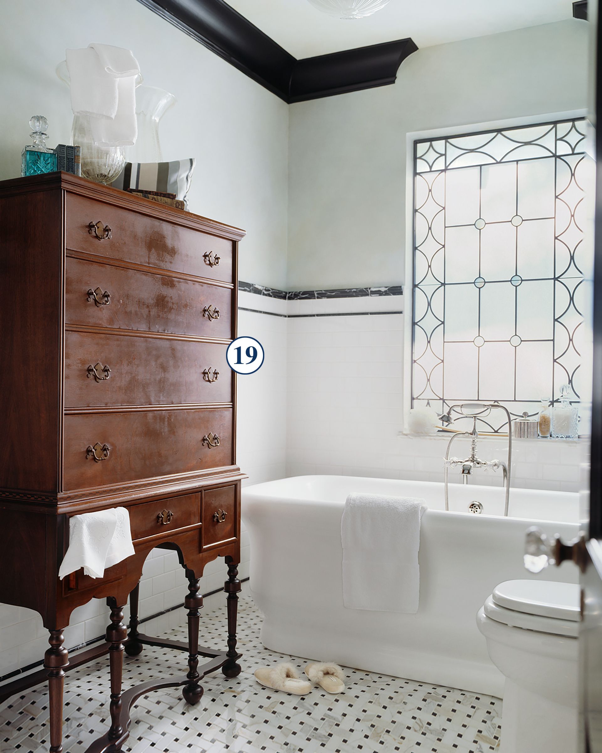 Bathroom with vintage dresser