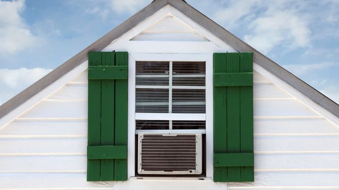 House with a clean window AC unit installed.