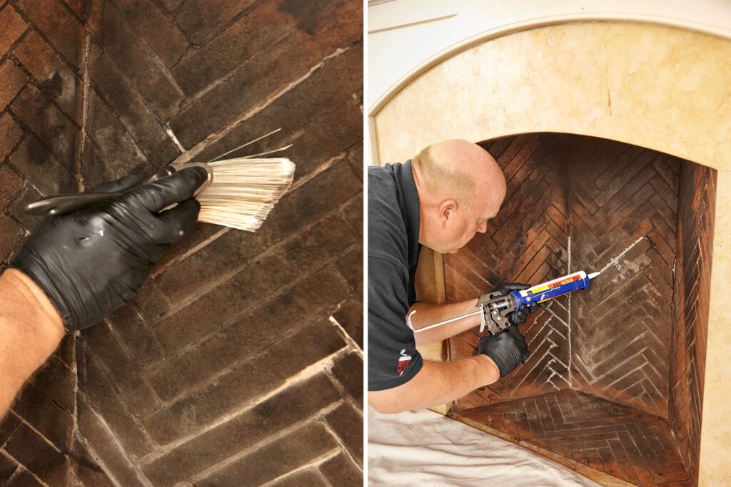 A man wetting the joints between bricks in a fireplace.