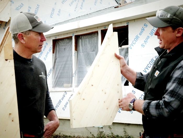 Jeff Sweenor shows Kevin O'Connor how to build rafter tails for the Westerly House