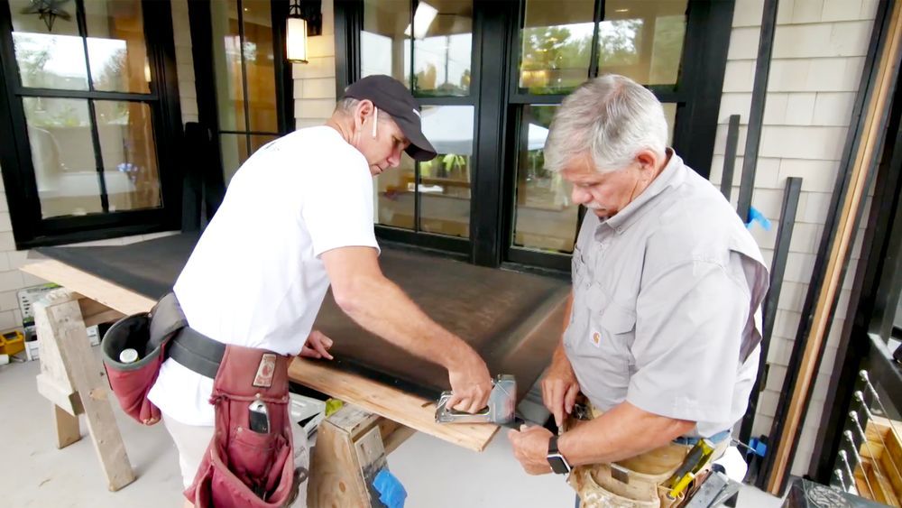 Jeff Sweenor and Tom Silva build a screened porch