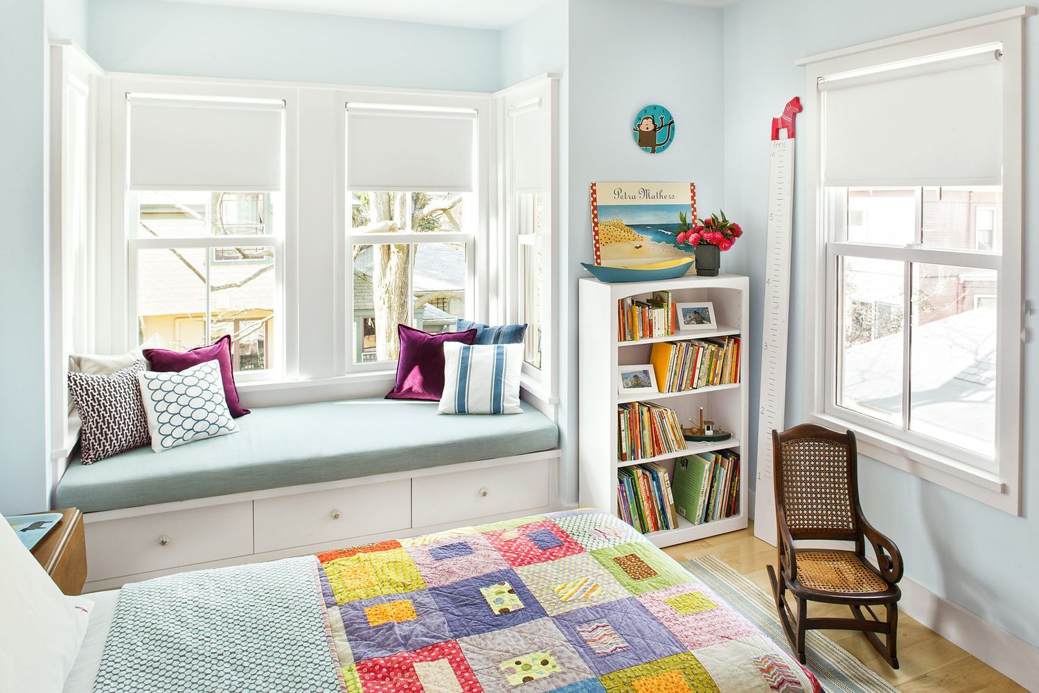 A bedroom with a bright color scheme.