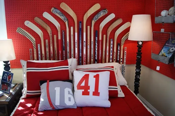 Hockey sticks used as wall decor in a child's bedroom.