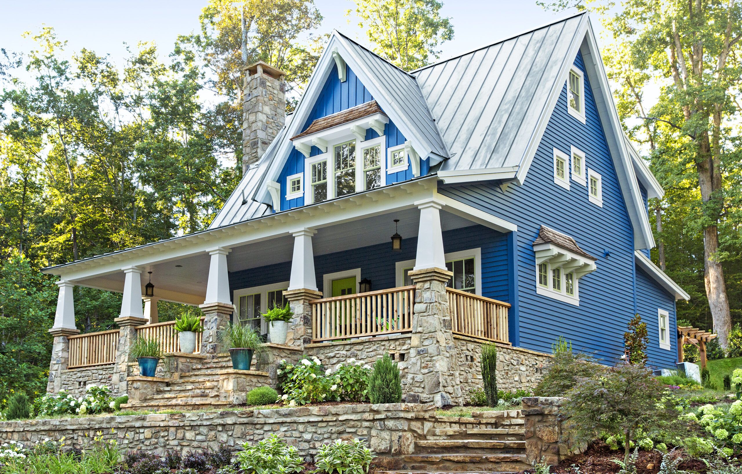 Evergreen branches with diy little log house and blue sky Art