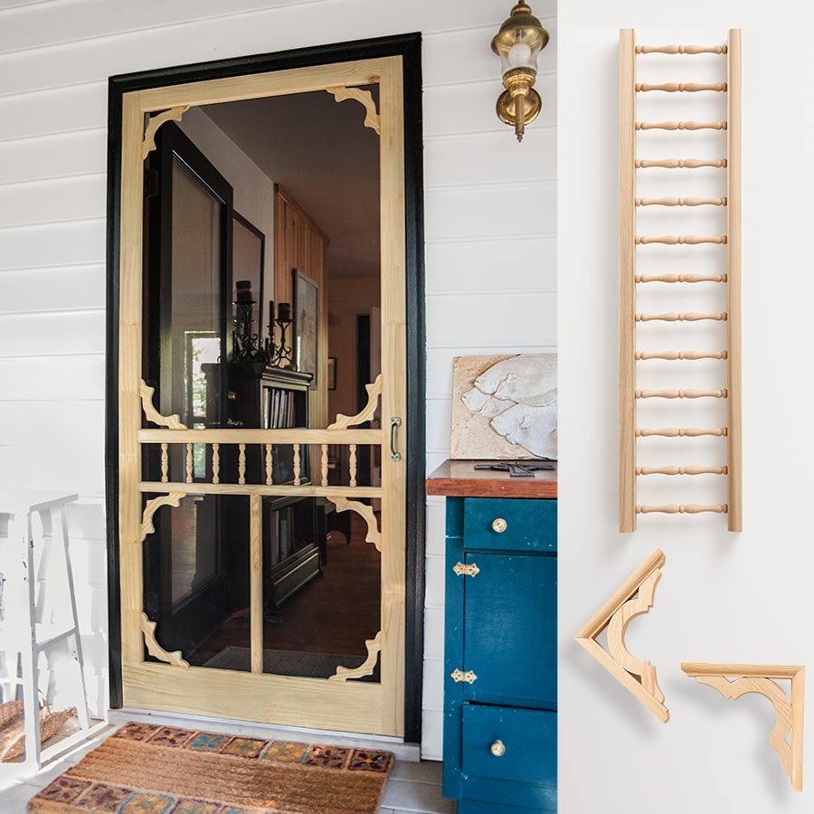 A vintage door beside a blue cabinet and in front of a brown doormat.