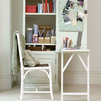 Armoire office with a fold out table which can be easily folded up and hidden in the closet. 