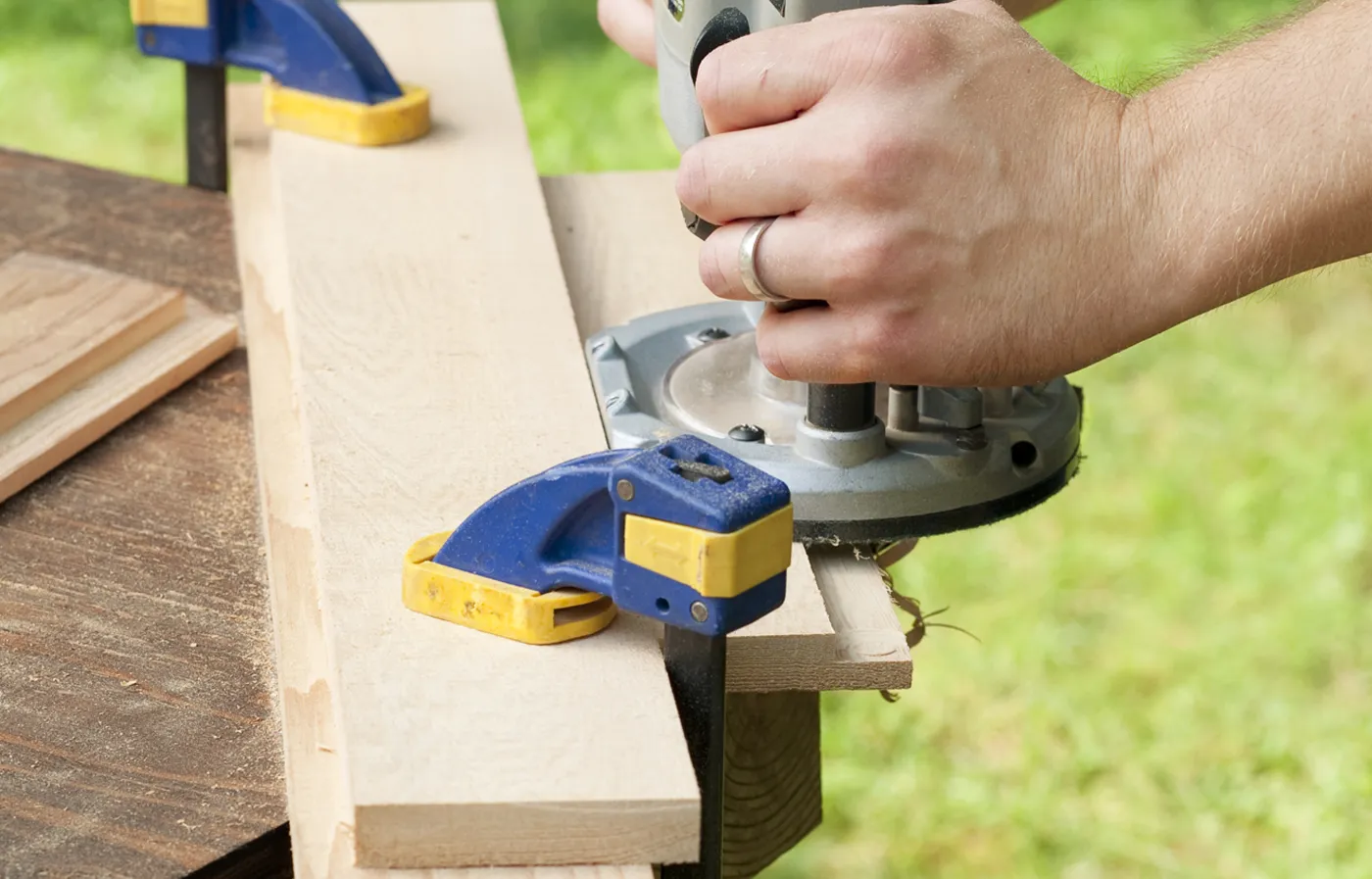 A person routing the rails.