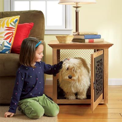 Dog inside of a custom-built wooden dog crate