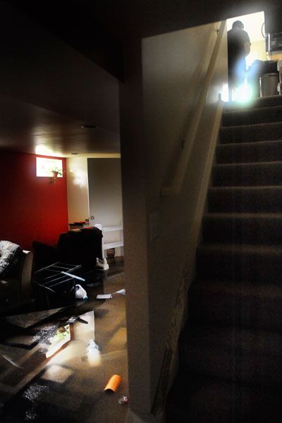 a basement flooded after a storm.