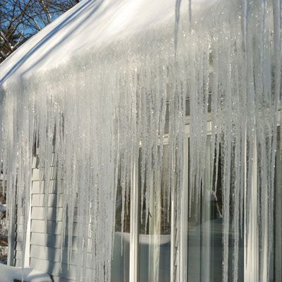 ice and snow covering a roof