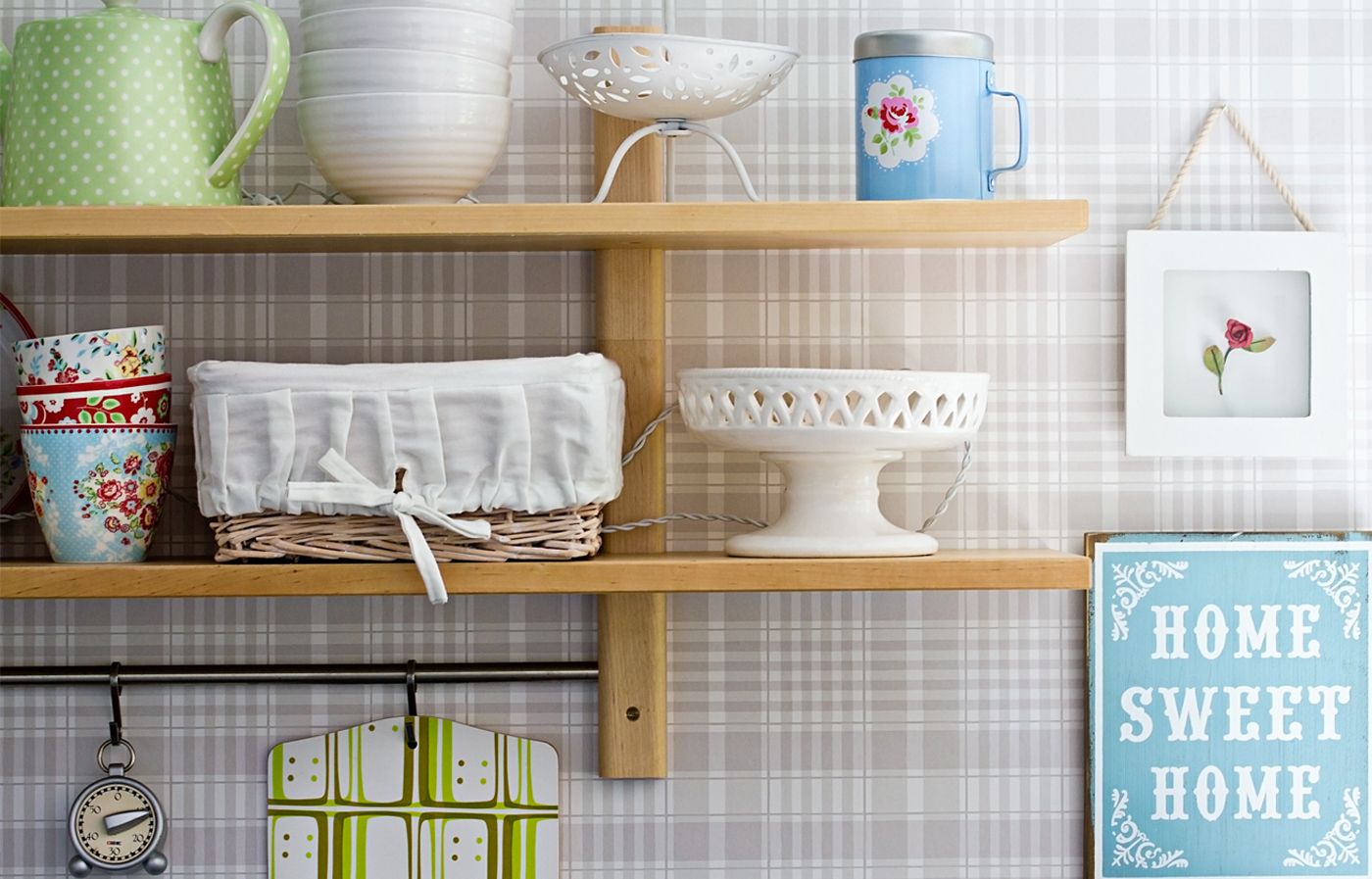 Plaid wallpaper behind open kitchen shelves