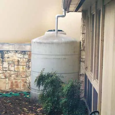 A rain barrel with a customizable feature.