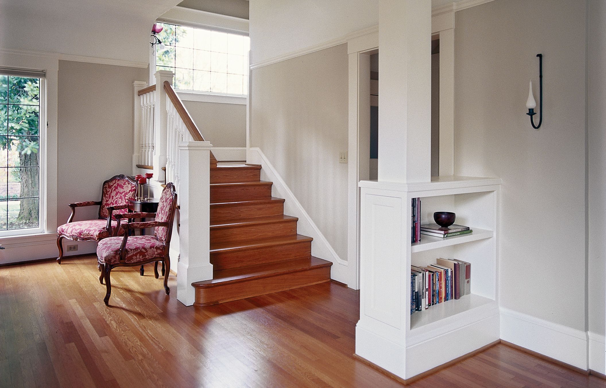 A storage unit built into a support column in a home.