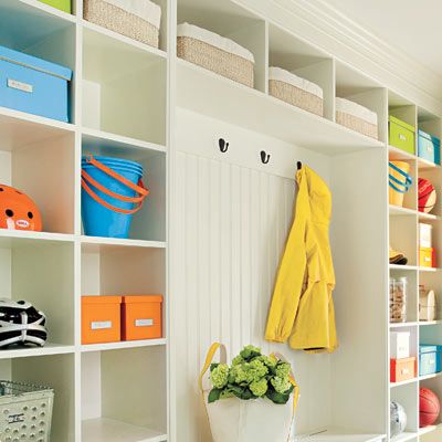 an up close view of a mudroom with a lot of cubbies