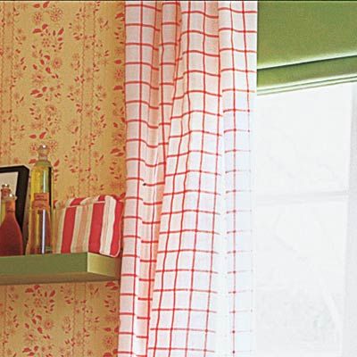 Patterned drapes that could be used in a bathroom.