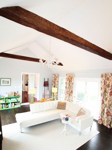 Faux wood beams in a fake-out family room.