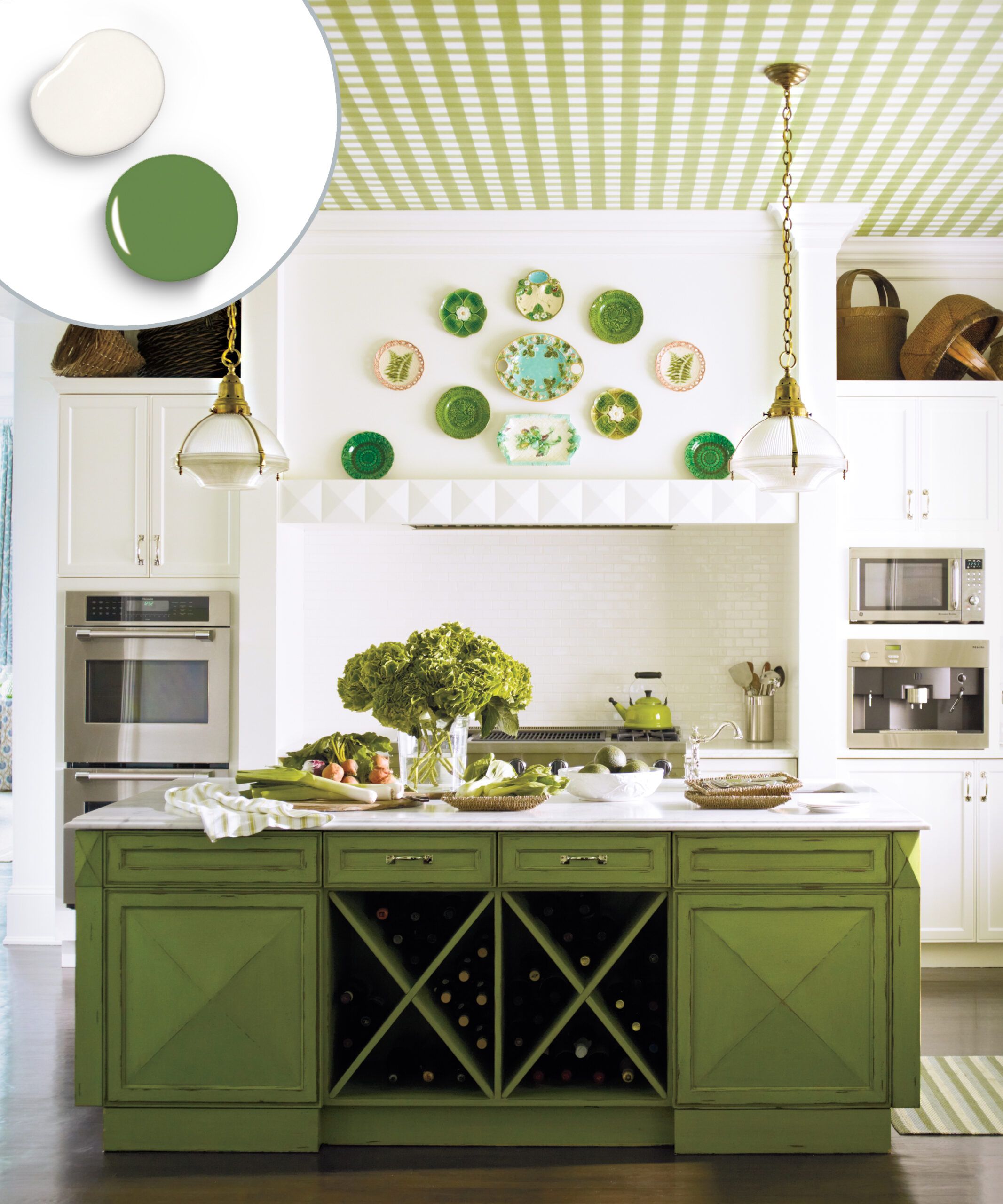 Kitchen cabinets with a leaf green and white color combination.