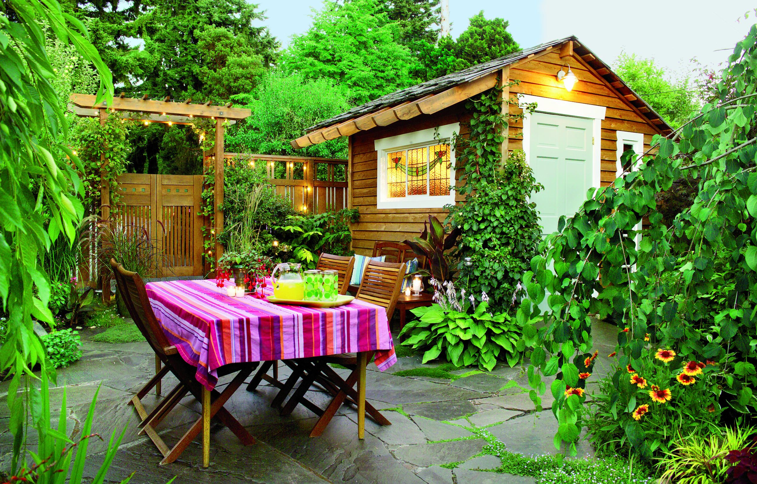 An Outdoor Dining Space with a flagstone floor.