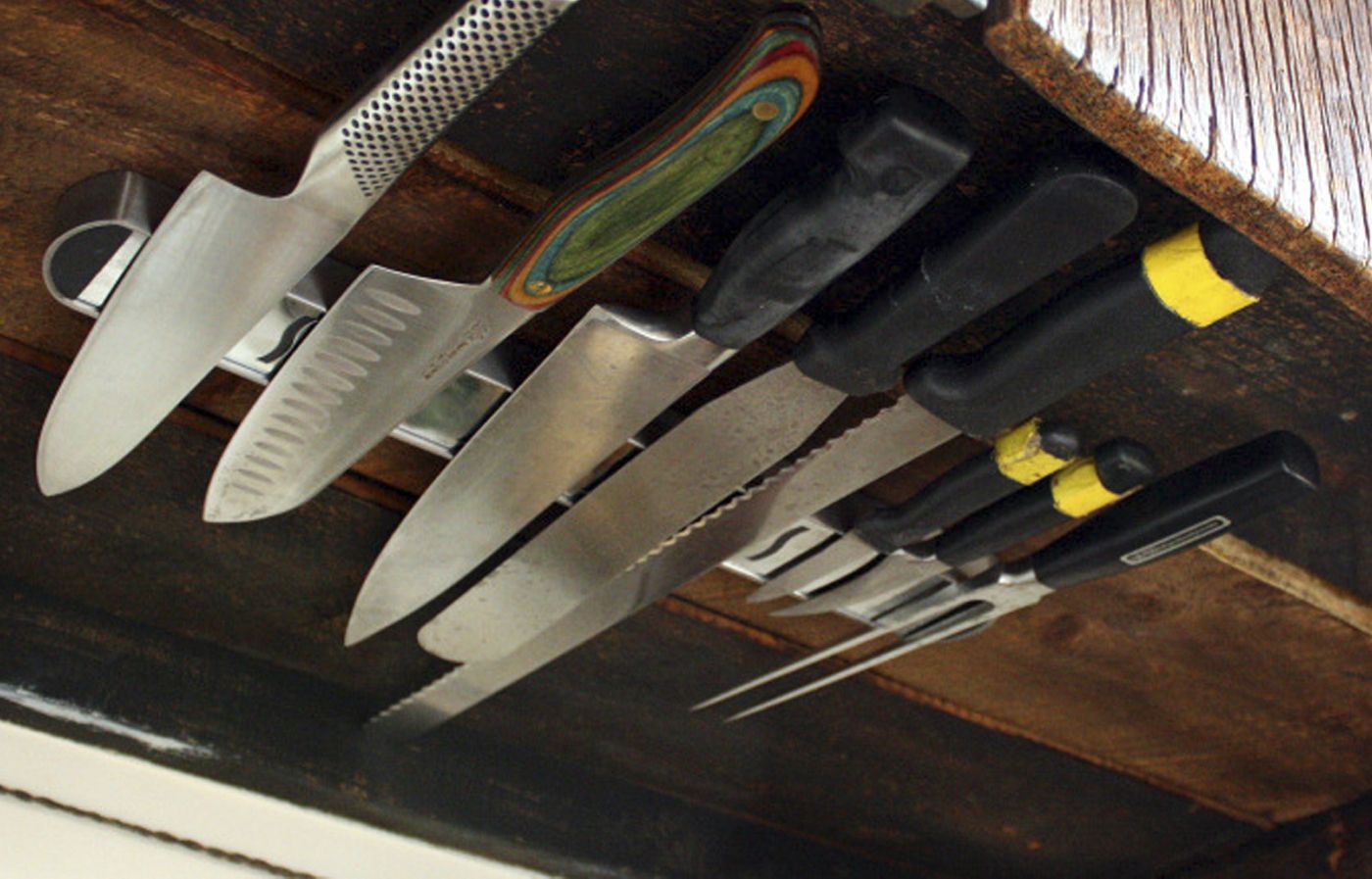 Image of a hidden knife rack in a kitchen, which is a great way to hide kitchen clutter