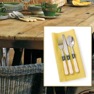 Image of elegant flatware used to refine the style of a rustic french dining room