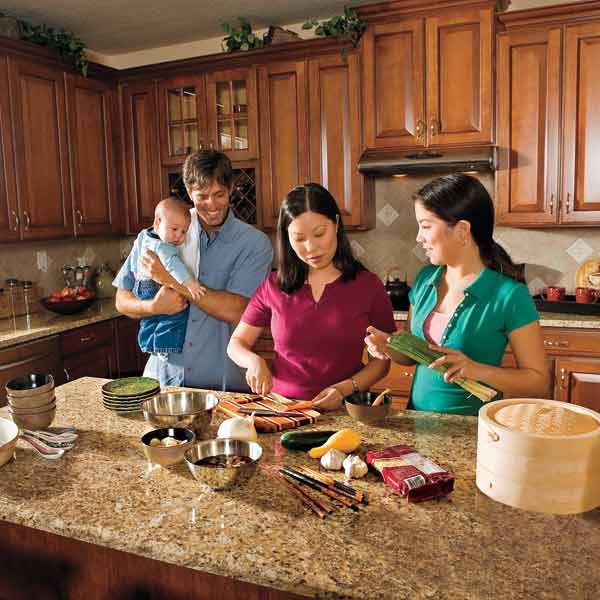 Contemporary White Kitchen with Concrete Countertop, Pull-Out Cutting Board  Stock Photo - Alamy