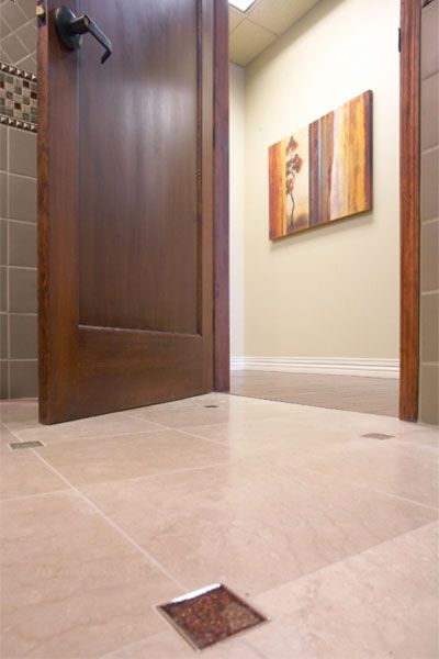 Image of a trip-free flooring transition in a bathroom, which is good to avoid trip hazards