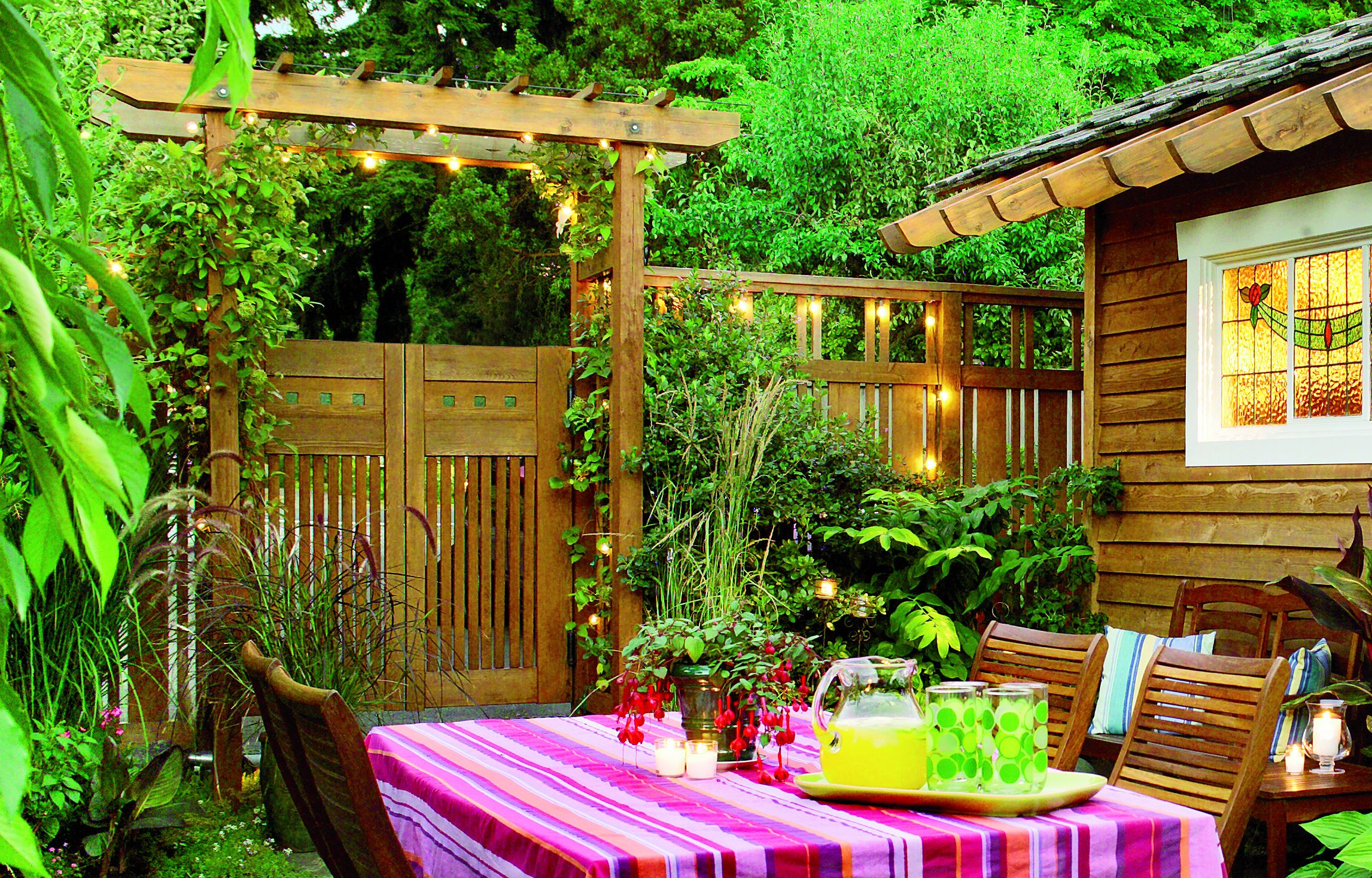 An Outdoor Dining Space with a fence creating a cozy enclosure.