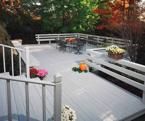 A solid white stained wood deck.