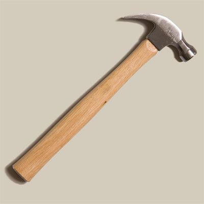 A claw hammer for tin punching.