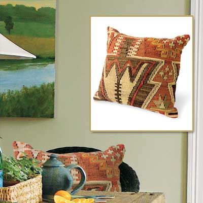 Image of a pattern wool pillow used to decorate a rustic French dining room