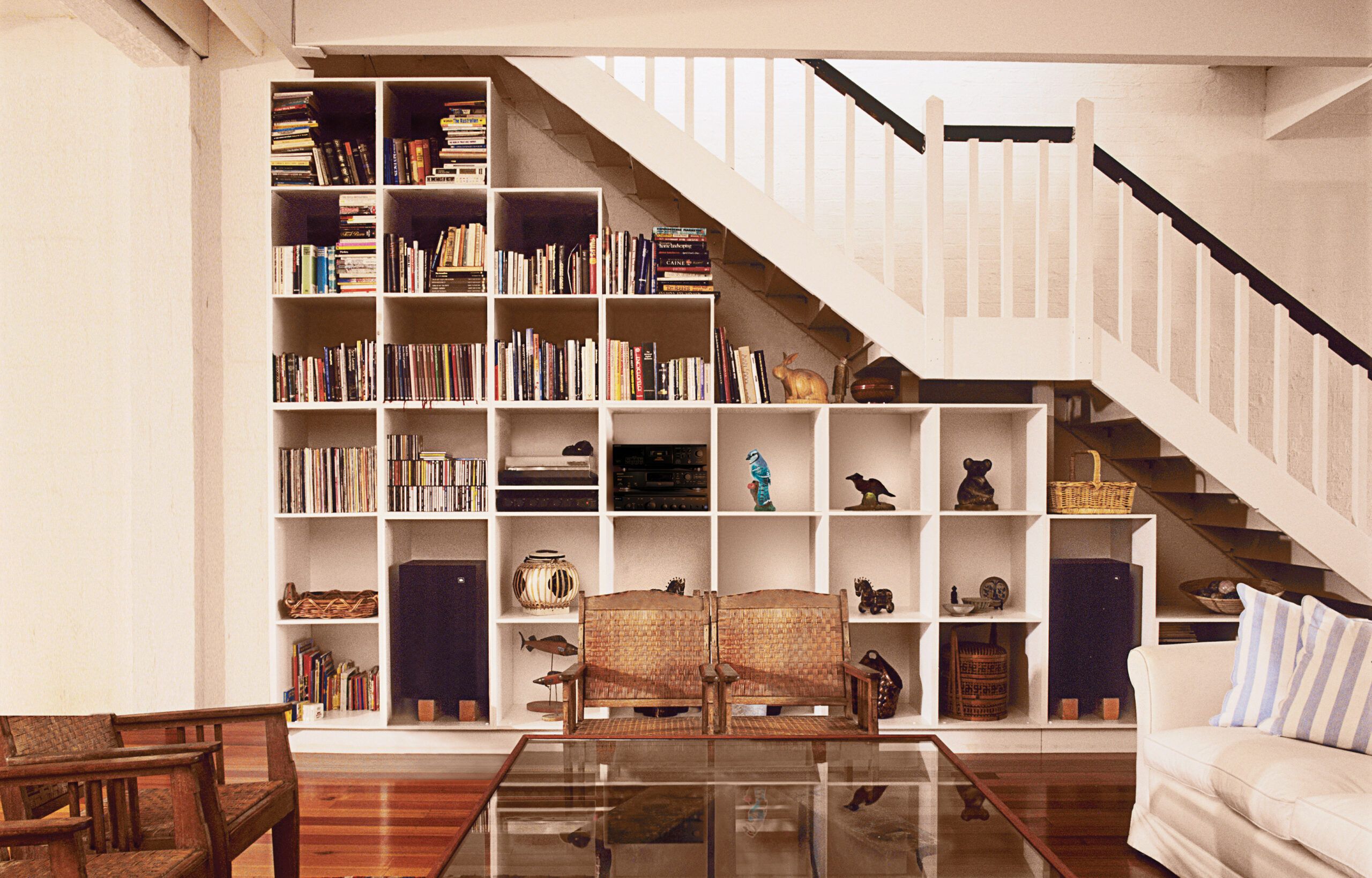 Shelving units installed below a stairwell.