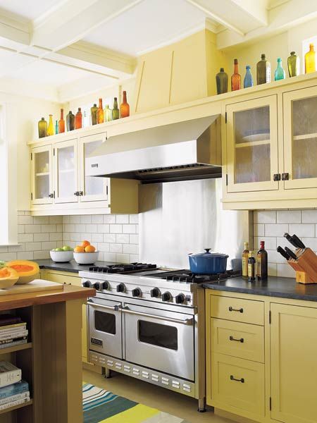 A kitchen vent hood over a stove.