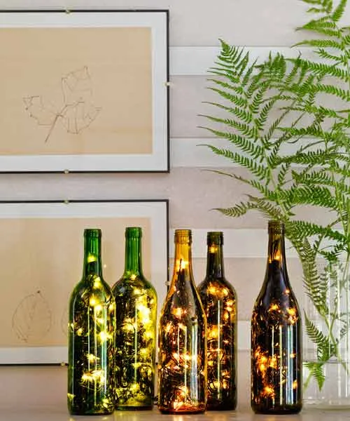 A festival light display in wine bottles