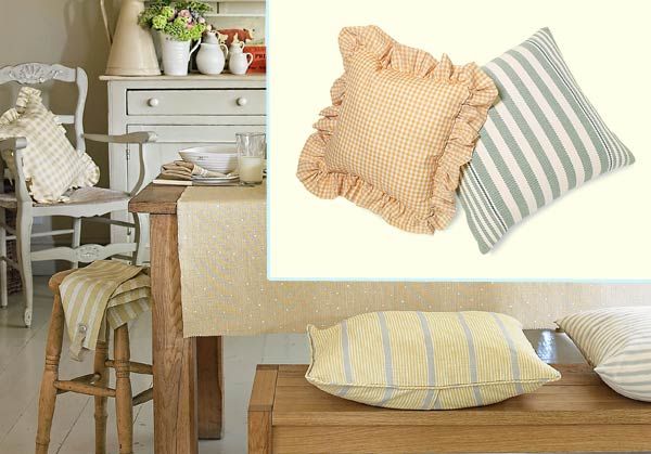 Patterned toss pillows in a Farmhouse-Fresh Breakfast Nook.