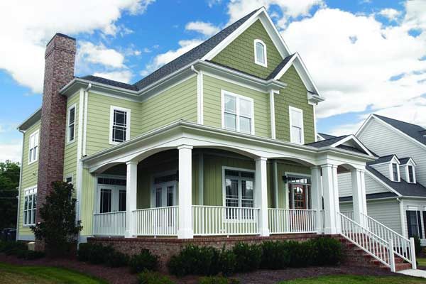 Image of a home with green fiber-cement siding