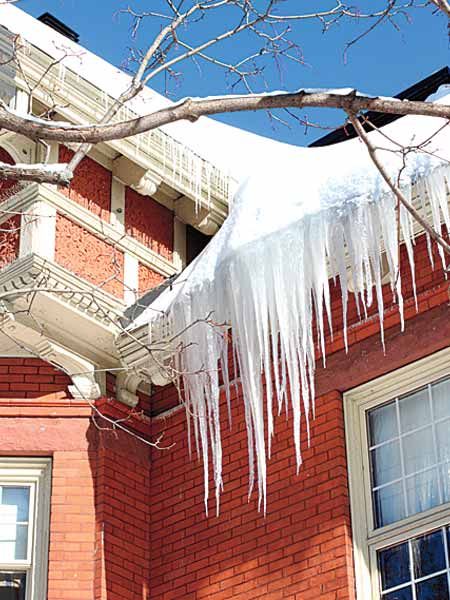 Ice dams on a home after a storm.